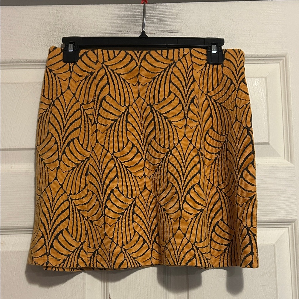 Stradivarius A-Line Mini Skirt Size Medium In Orange with Black Leaf Pattern